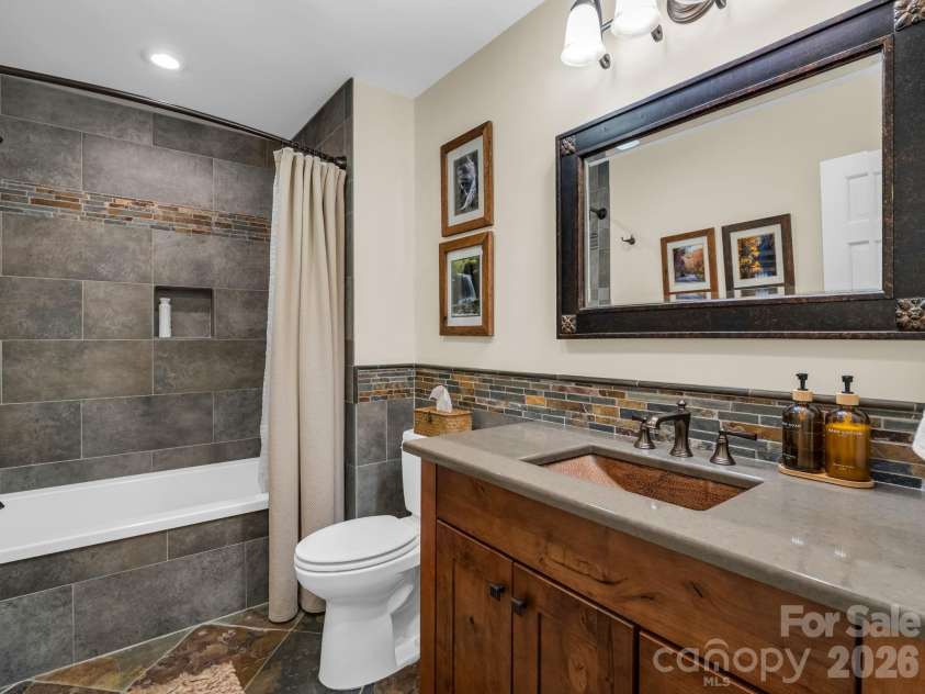 558 Middle Connestee Trail, Brevard, NC 28712.  MLS# CAR4391380, YatesRealty ID 38722. Hall Bath With Custom Finishes