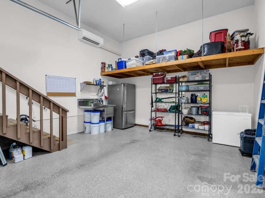 558 Middle Connestee Trail, Brevard, NC 28712.  MLS# CAR4391380, YatesRealty ID 38722. Heated/Cooled Garage