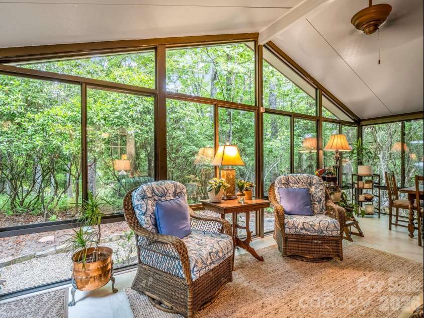558 Middle Connestee Trail, Brevard, NC 28712.  MLS# CAR4391380, YatesRealty ID 38722. Large 3 Season Sunroom