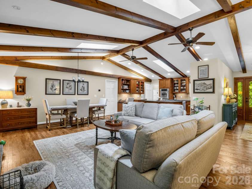 558 Middle Connestee Trail, Brevard, NC 28712.  MLS# CAR4391380, YatesRealty ID 38722. Open Living/Dining/Kitchen