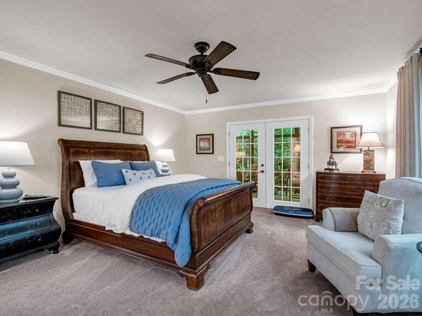 558 Middle Connestee Trail, Brevard, NC 28712.  MLS# CAR4391380, YatesRealty ID 38722. Primary Bedroom w/Sunroom Access