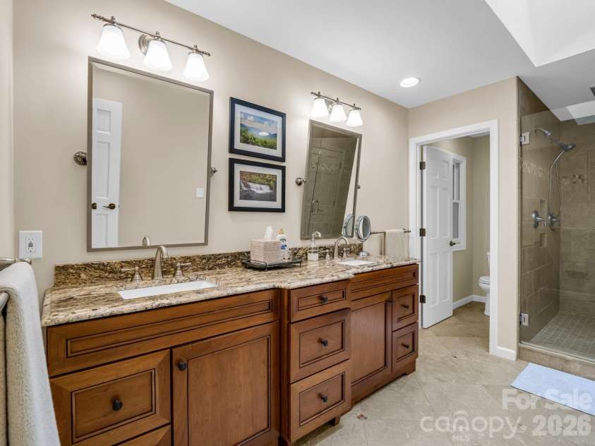 558 Middle Connestee Trail, Brevard, NC 28712.  MLS# CAR4391380, YatesRealty ID 38722. Primary Updated En-Suite Bath