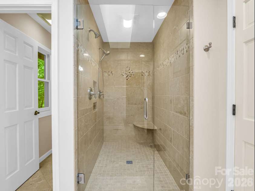 558 Middle Connestee Trail, Brevard, NC 28712.  MLS# CAR4391380, YatesRealty ID 38722. Primary Walk-In Shower