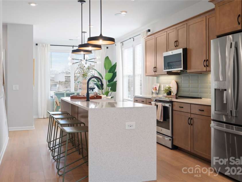 5604 Kingspan Drive, Charlotte, NC 28217.  MLS# CAR4240425, YatesRealty ID 3873. The Braden | Southmont *actual finishes, orientation, and structural selections may vary.