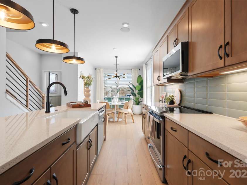 5604 Kingspan Drive, Charlotte, NC 28217.  MLS# CAR4240425, YatesRealty ID 3873. The Braden | Southmont *actual finishes, orientation, and structural selections may vary.