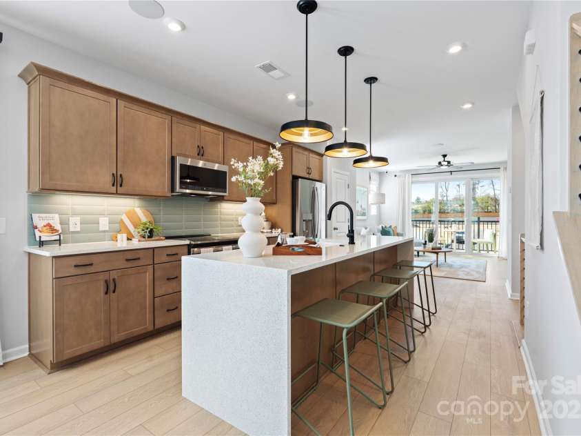 5604 Kingspan Drive, Charlotte, NC 28217.  MLS# CAR4240425, YatesRealty ID 3873. The Braden | Southmont *actual finishes, orientation, and structural selections may vary.
