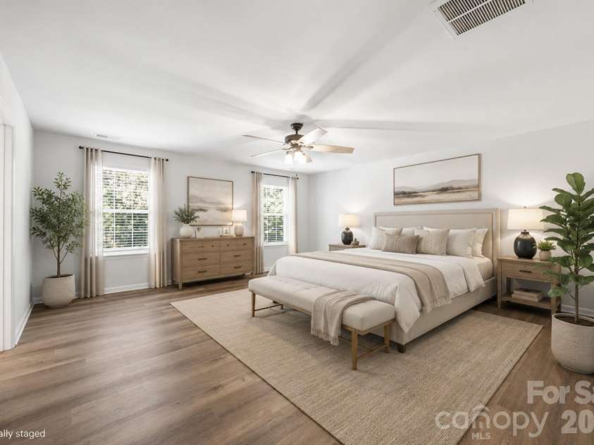 236 Tackle Box Drive, Troutman, NC 28166.  MLS# CAR4403974, YatesRealty ID 38734. Large primary bedroom virtually staged