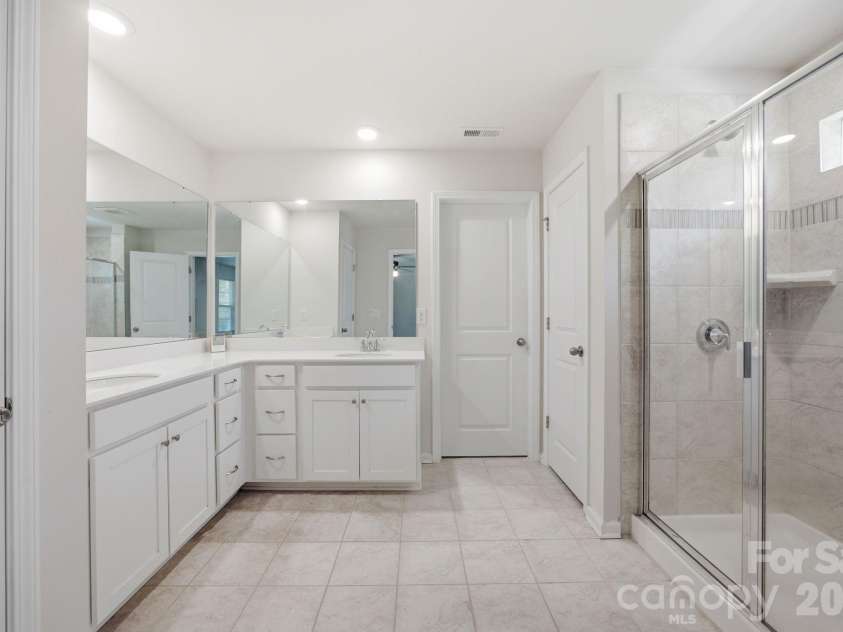 236 Tackle Box Drive, Troutman, NC 28166.  MLS# CAR4403974, YatesRealty ID 38734. Primary bathroom upstairs