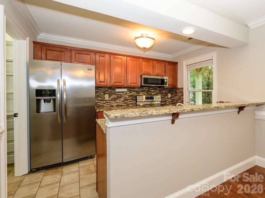 6060 Acadian Woods Drive, Charlotte, NC 28227.  MLS# CAR4385264, YatesRealty ID 38740. Kitchen/Breakfast Bar