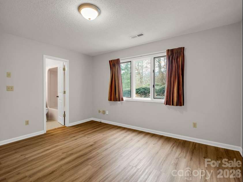 303 Golfside Drive, Flat Rock, NC 28731.  MLS# CAR4352629, YatesRealty ID 3875. 2nd Bedroom