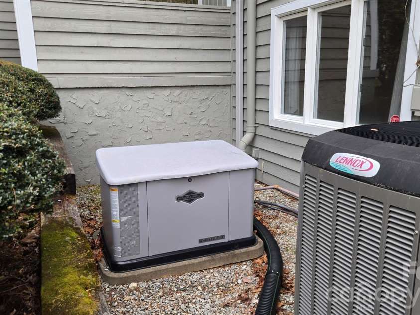 303 Golfside Drive, Flat Rock, NC 28731.  MLS# CAR4352629, YatesRealty ID 3875. Backup Generator
