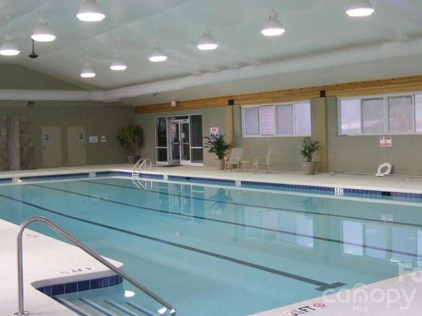 303 Golfside Drive, Flat Rock, NC 28731.  MLS# CAR4352629, YatesRealty ID 3875. Community Indoor Pool