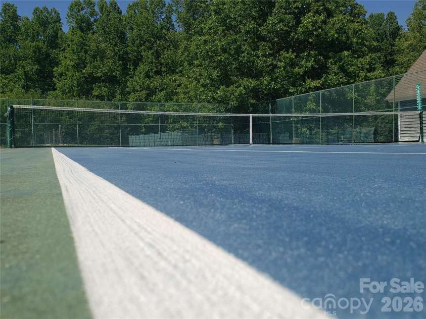 303 Golfside Drive, Flat Rock, NC 28731.  MLS# CAR4352629, YatesRealty ID 3875. Community Tennis Courts