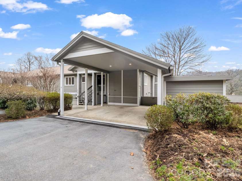 303 Golfside Drive, Flat Rock, NC 28731.  MLS# CAR4352629, YatesRealty ID 3875. Covered Oversized Carport