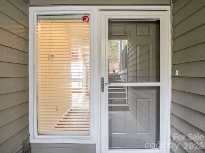303 Golfside Drive, Flat Rock, NC 28731.  MLS# CAR4352629, YatesRealty ID 3875. Entry
