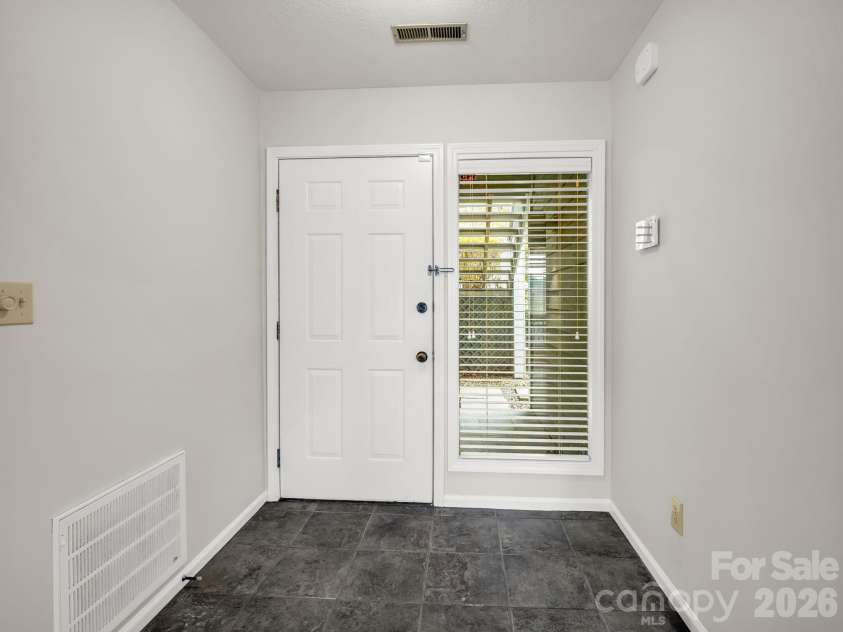 303 Golfside Drive, Flat Rock, NC 28731.  MLS# CAR4352629, YatesRealty ID 3875. Entry Foyer