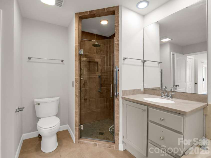 303 Golfside Drive, Flat Rock, NC 28731.  MLS# CAR4352629, YatesRealty ID 3875. Primary Bath