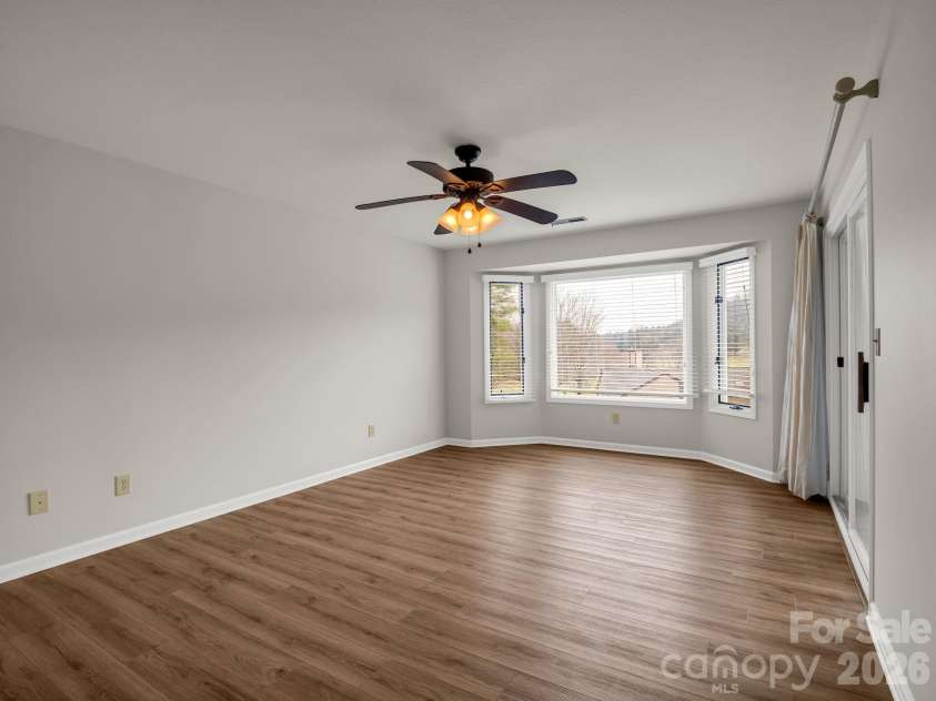 303 Golfside Drive, Flat Rock, NC 28731.  MLS# CAR4352629, YatesRealty ID 3875. Primary Bedroom
