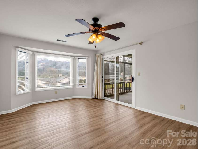 303 Golfside Drive, Flat Rock, NC 28731.  MLS# CAR4352629, YatesRealty ID 3875. Primary Bedroom