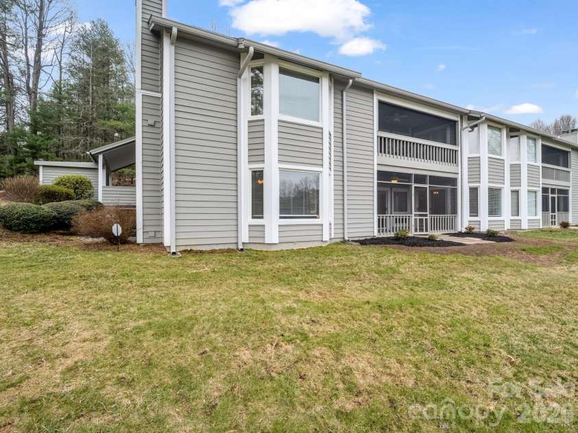 303 Golfside Drive, Flat Rock, NC 28731.  MLS# CAR4352629, YatesRealty ID 3875. Rear of building