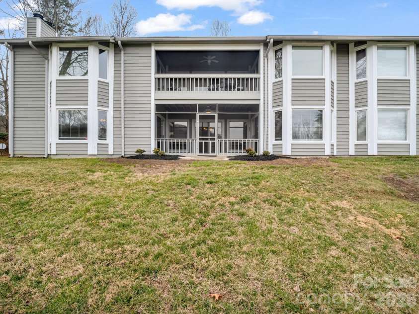 303 Golfside Drive, Flat Rock, NC 28731.  MLS# CAR4352629, YatesRealty ID 3875. Rear of building