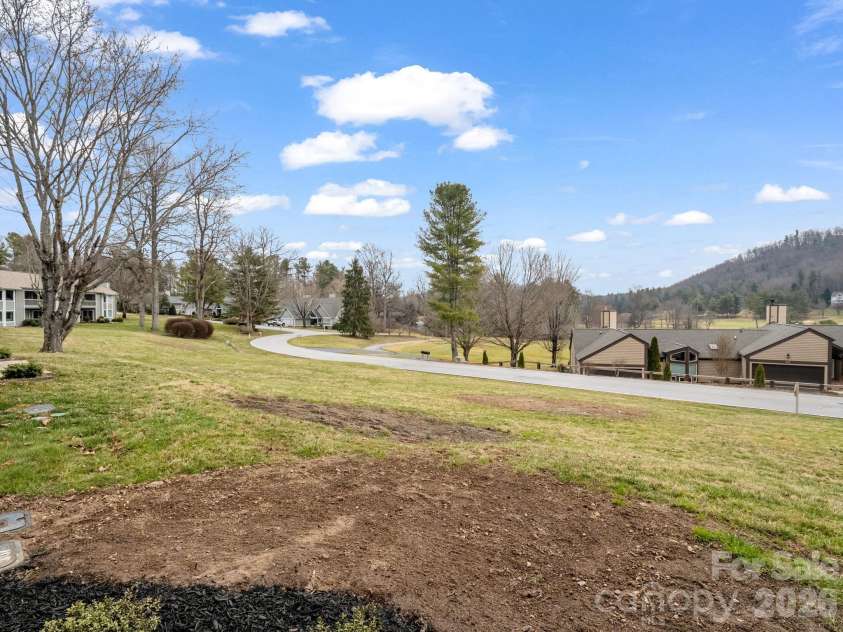 303 Golfside Drive, Flat Rock, NC 28731.  MLS# CAR4352629, YatesRealty ID 3875. View from back patio
