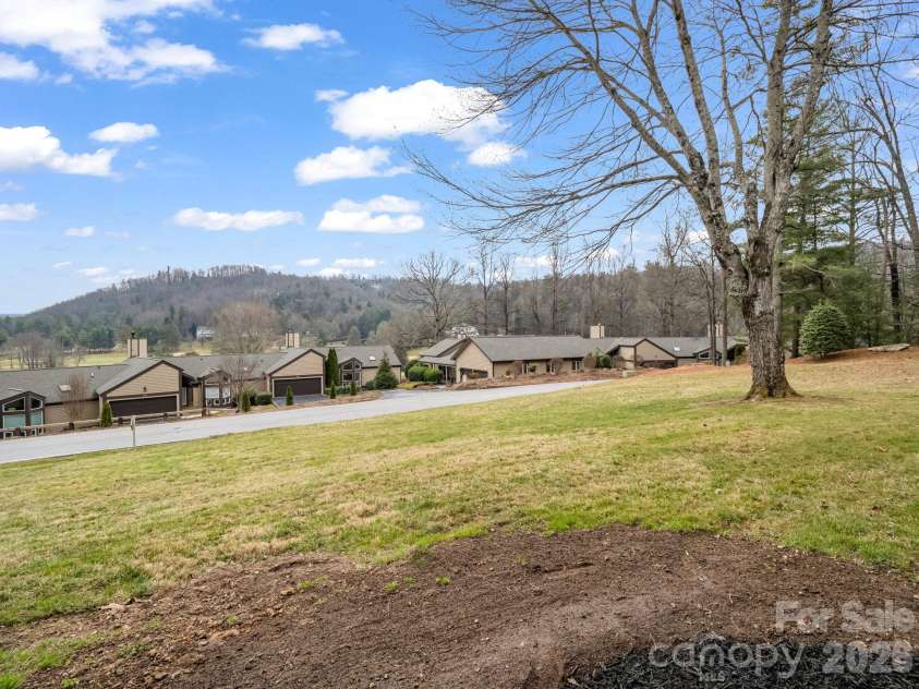 303 Golfside Drive, Flat Rock, NC 28731.  MLS# CAR4352629, YatesRealty ID 3875. View from back patio