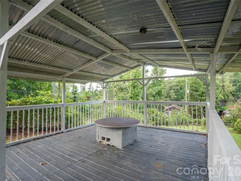 1271 Upper Brush Creek Road, Fairview, NC 28730.  MLS# CAR4398418, YatesRealty ID 38771. Built in table for convenience