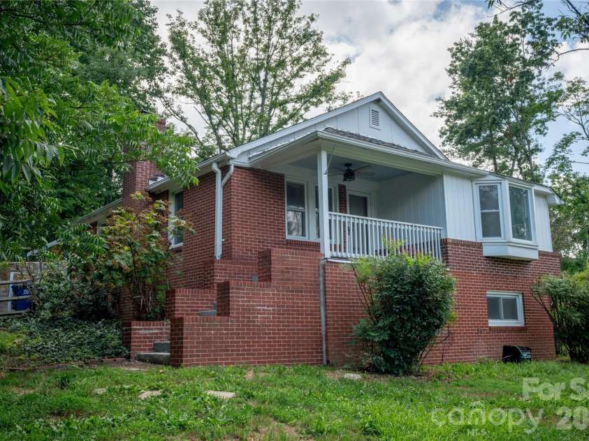 1271 Upper Brush Creek Road, Fairview, NC 28730.  MLS# CAR4398418, YatesRealty ID 38771. Charming brick bungalow brimming with character
