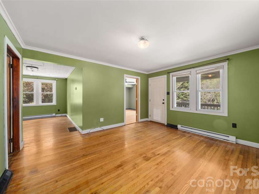 1271 Upper Brush Creek Road, Fairview, NC 28730.  MLS# CAR4398418, YatesRealty ID 38771. Hardwoods throughout