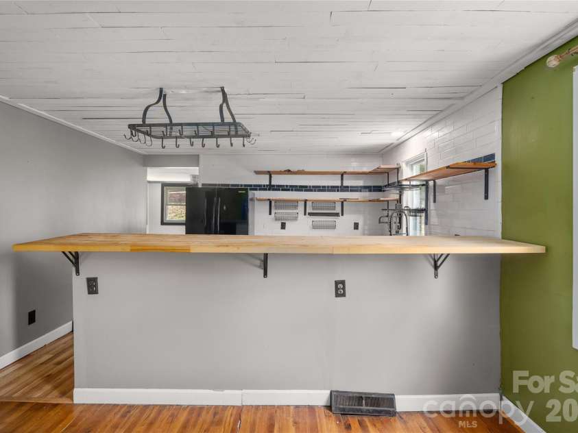 1271 Upper Brush Creek Road, Fairview, NC 28730.  MLS# CAR4398418, YatesRealty ID 38771. Large island for kitchen prep