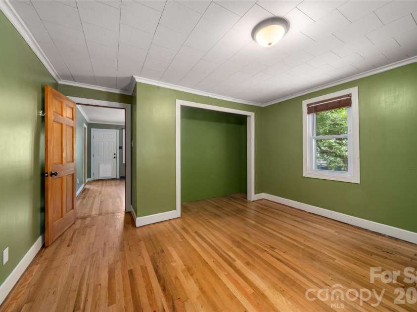 1271 Upper Brush Creek Road, Fairview, NC 28730.  MLS# CAR4398418, YatesRealty ID 38771. Second bedroom with large closet