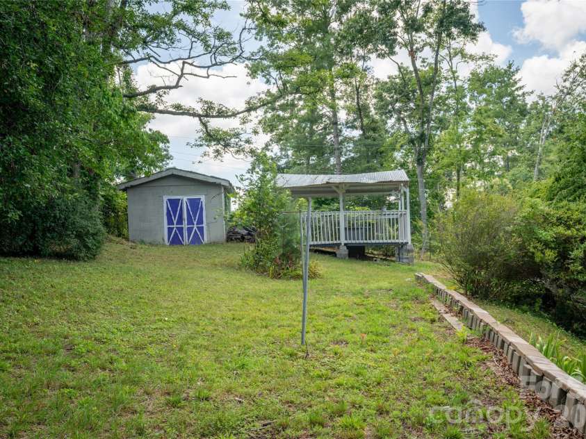 1271 Upper Brush Creek Road, Fairview, NC 28730.  MLS# CAR4398418, YatesRealty ID 38771. Shed for extra storage