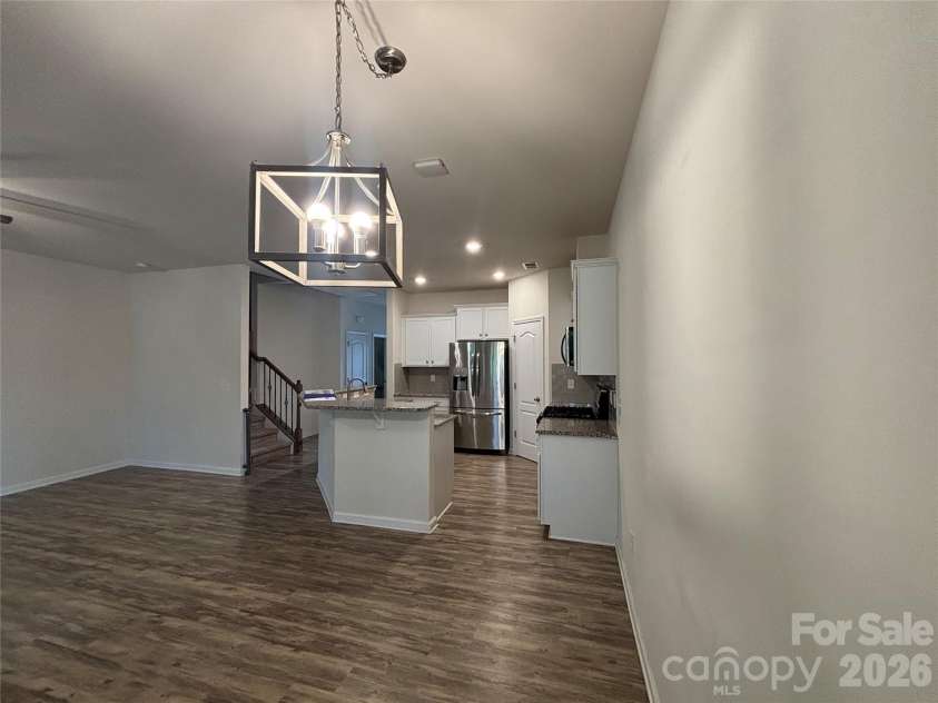 347 Kennebel Place, Fort Mill, SC 29715.  MLS# CAR4402744, YatesRealty ID 38775. Empty Kitchen and Dining