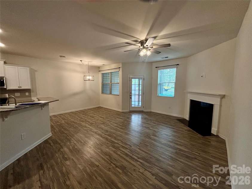 347 Kennebel Place, Fort Mill, SC 29715.  MLS# CAR4402744, YatesRealty ID 38775. Empty Living Room