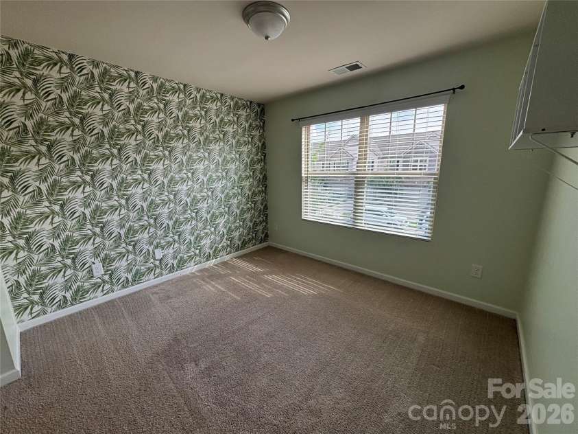 347 Kennebel Place, Fort Mill, SC 29715.  MLS# CAR4402744, YatesRealty ID 38775. Empty Third Bedroom