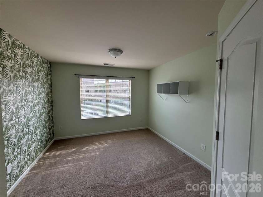 347 Kennebel Place, Fort Mill, SC 29715.  MLS# CAR4402744, YatesRealty ID 38775. Empty Third Bedroom