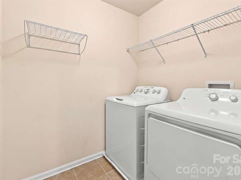 347 Kennebel Place, Fort Mill, SC 29715.  MLS# CAR4402744, YatesRealty ID 38775. Laundry Room