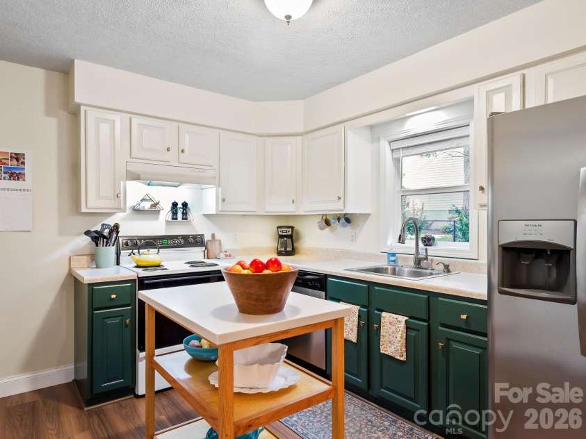 210 Hillandale Drive Extension, East Flat Rock, NC 28726.  MLS# CAR4405168, YatesRealty ID 38779. A light and bright kitchen will bring out the chef in you.
