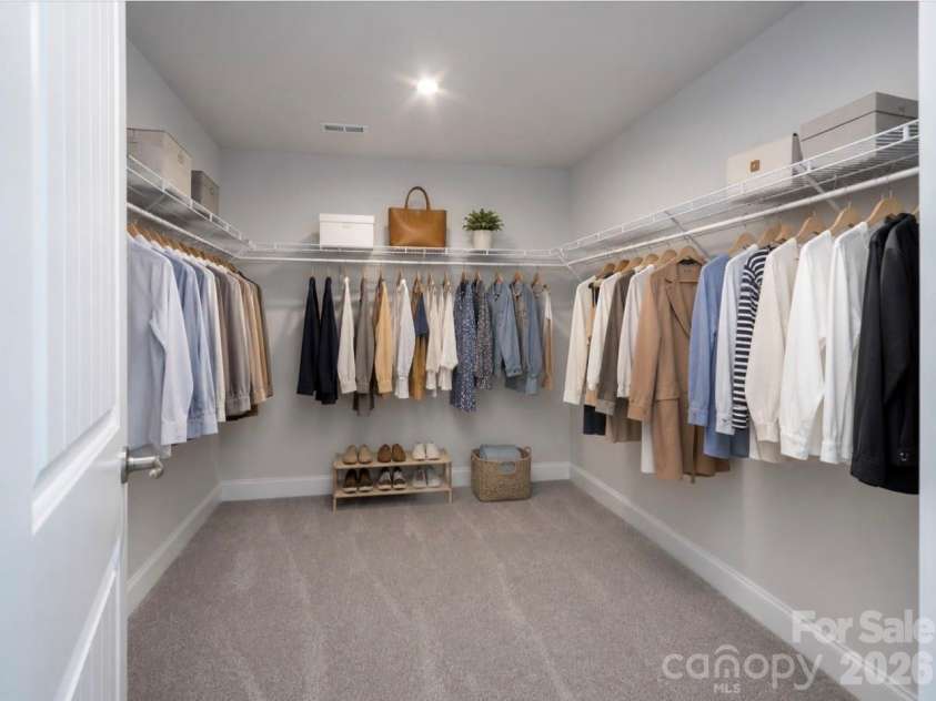 149 High Rock Court, Statesville, NC 26877.  MLS# CAR4412059, YatesRealty ID 38785. AI Generated Image Primary Closet