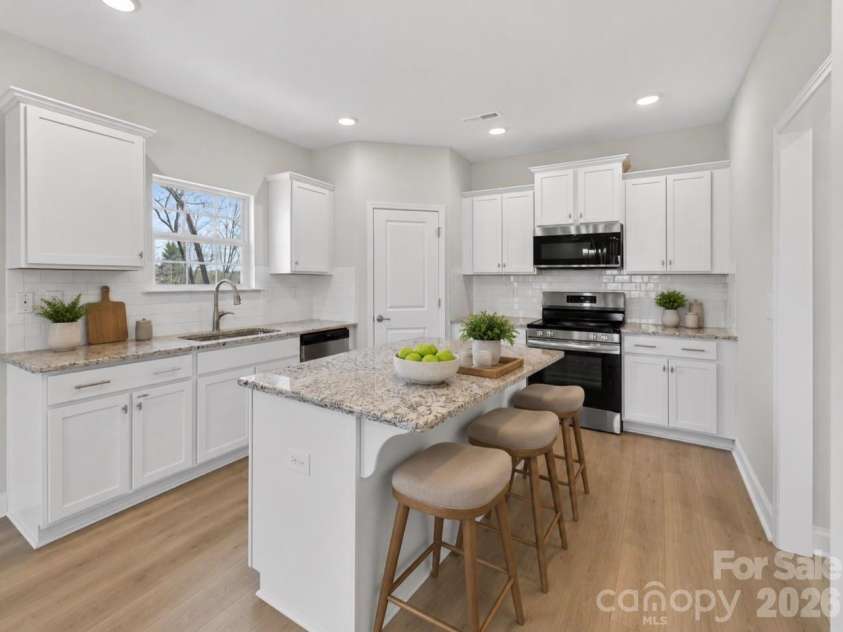 149 High Rock Court, Statesville, NC 26877.  MLS# CAR4412059, YatesRealty ID 38785. AI Generated ImageKitchen