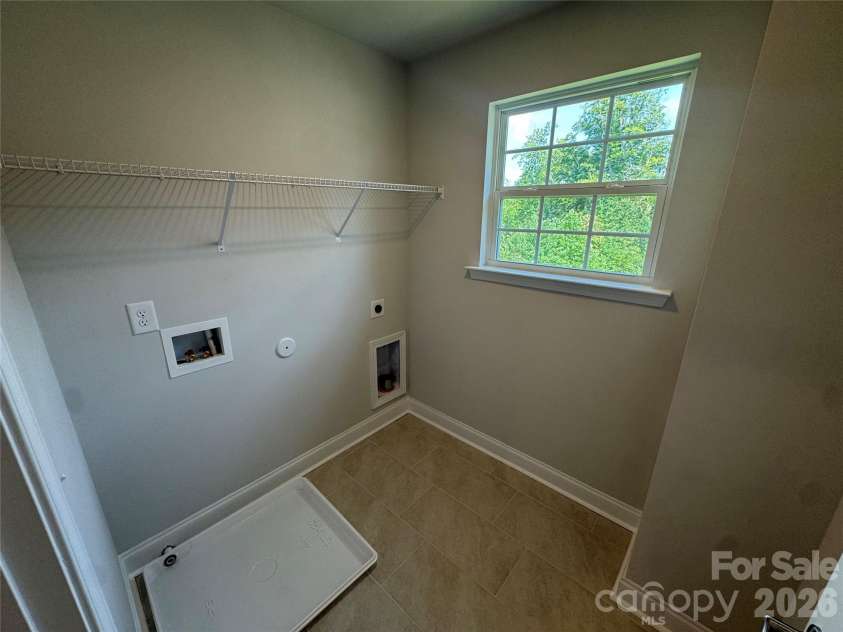 149 High Rock Court, Statesville, NC 26877.  MLS# CAR4412059, YatesRealty ID 38785. Laundry Room