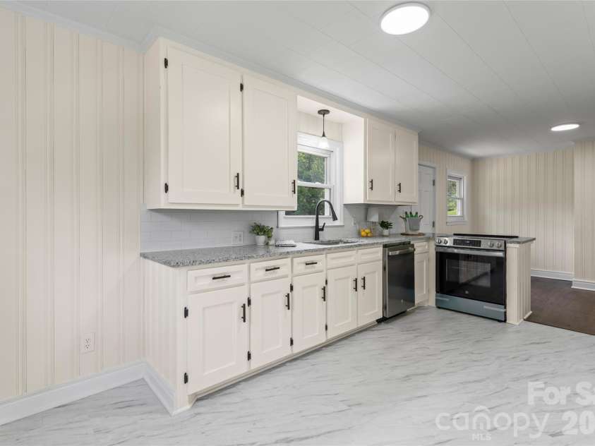 1034 Patton Avenue, Albemarle, NC 28001.  MLS# CAR4406057, YatesRealty ID 38787. Modern updated fixtures
