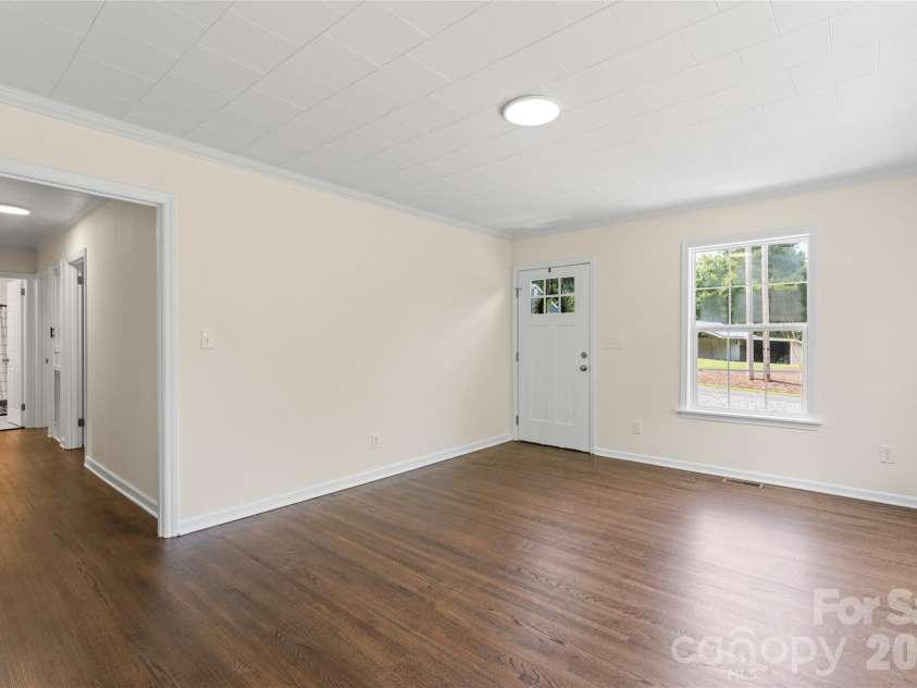 1034 Patton Avenue, Albemarle, NC 28001.  MLS# CAR4406057, YatesRealty ID 38787. Refinished wooden flooring