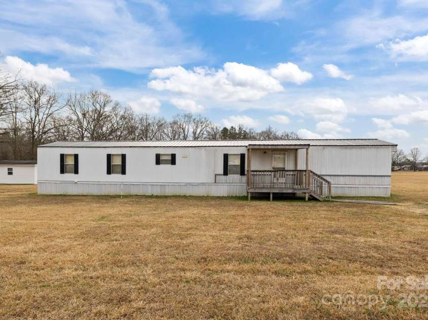 2909 New Town Road, Monroe, NC 28110.  MLS# CAR4330997, YatesRealty ID 38789. 