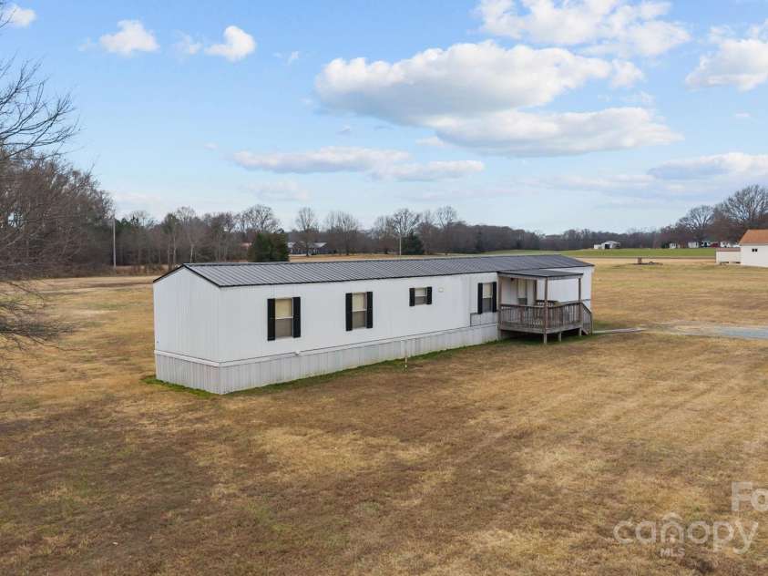 2909 New Town Road, Monroe, NC 28110.  MLS# CAR4330997, YatesRealty ID 38789. 