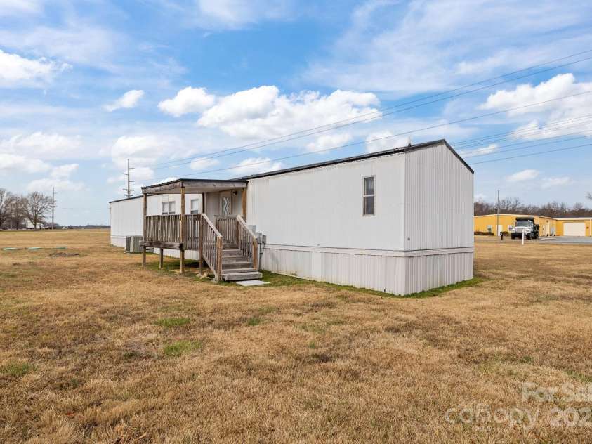 2909 New Town Road, Monroe, NC 28110.  MLS# CAR4330997, YatesRealty ID 38789. 