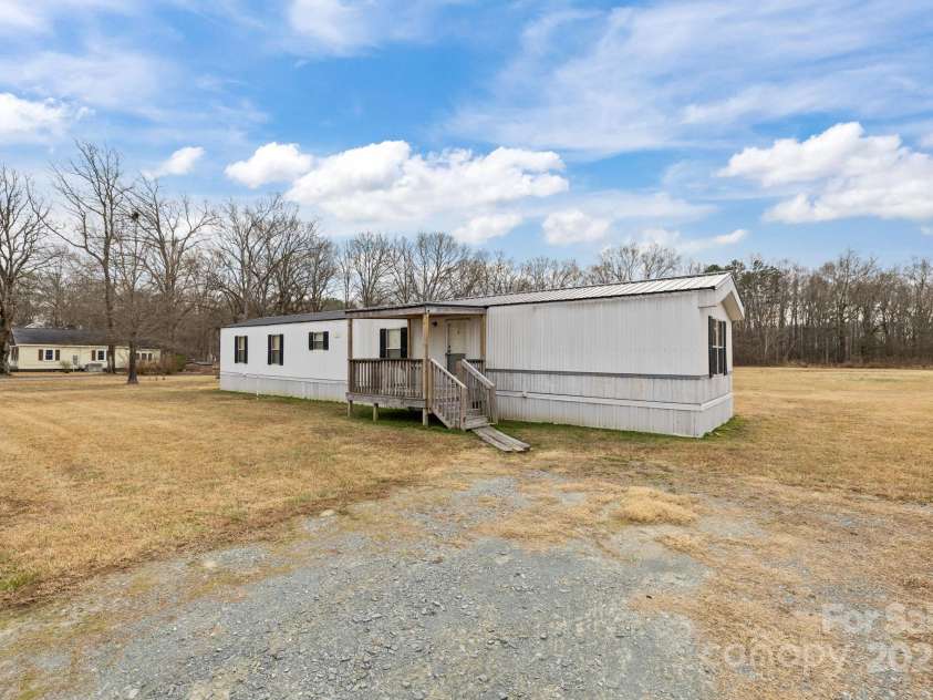2909 New Town Road, Monroe, NC 28110.  MLS# CAR4330997, YatesRealty ID 38789. 