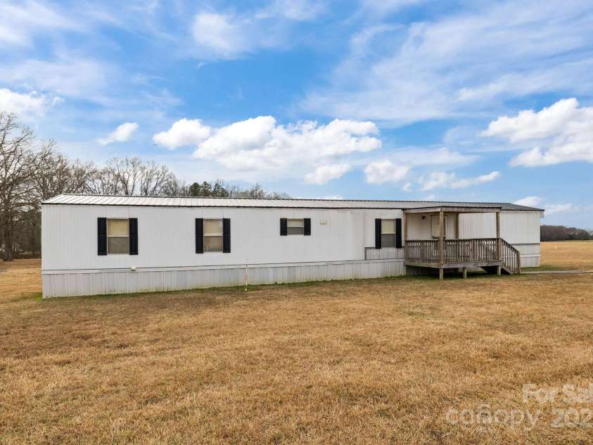2909 New Town Road, Monroe, NC 28110.  MLS# CAR4330997, YatesRealty ID 38789. 