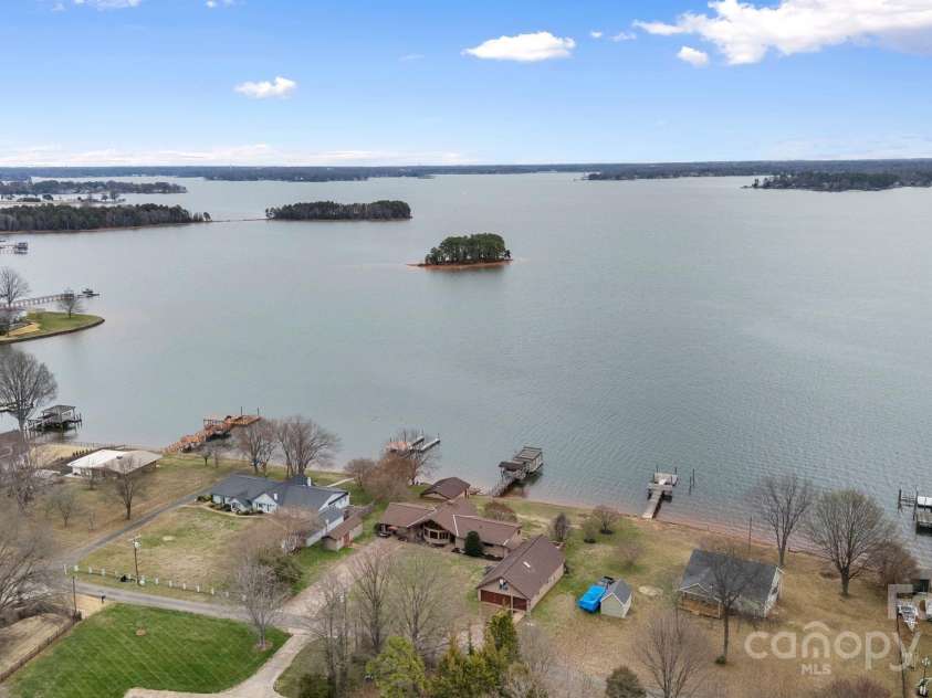 167 Points End Drive, Mooresville, NC 28117.  MLS# CAR4230820, YatesRealty ID 3879. Gorgeous views of Lake Norman with maximum privacy and NO HOA